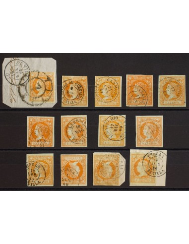 Andalucía. Filatelia. º52(13). 1860. Conjunto de trece sellos del 4 cuartos amarillo inutilizados con los fechadores de la pro
